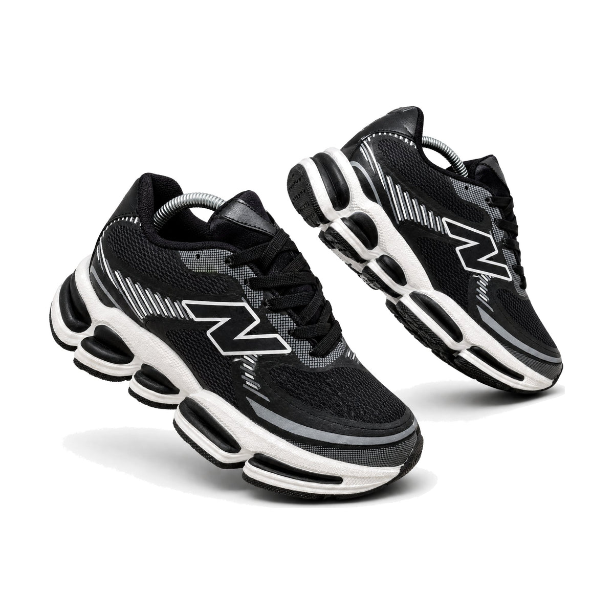 New Balance 2000 color negro — par en vista 3D, fondo blanco