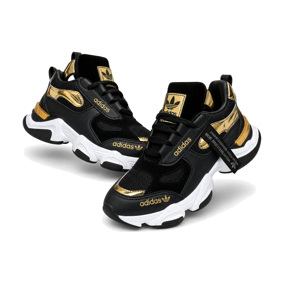 Adidas Fashion Dama color negro dorado — par en vista 3D, fondo blanco