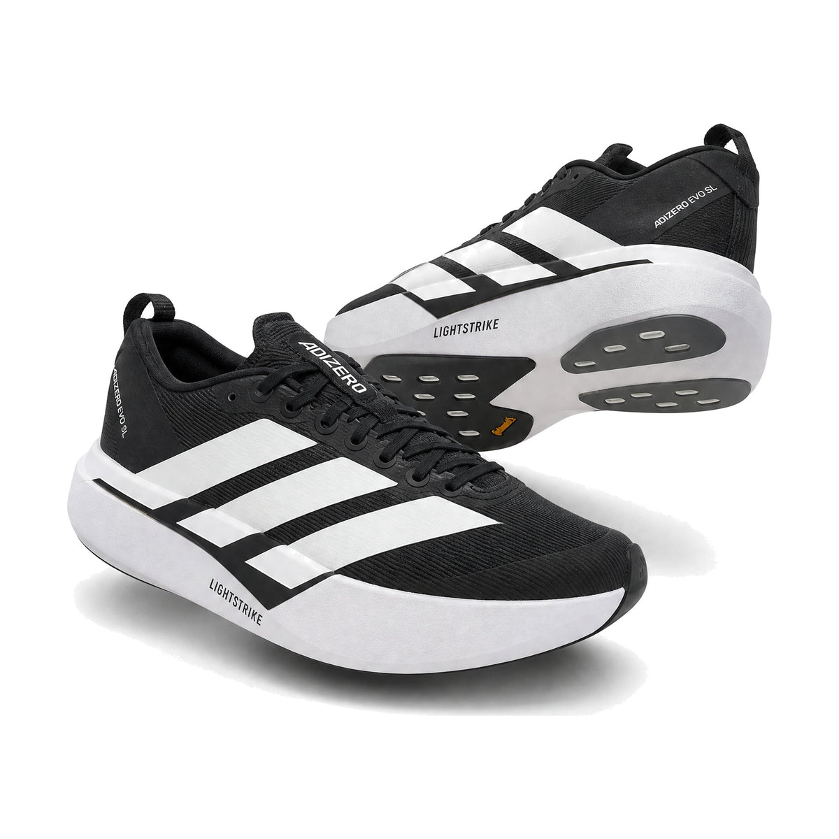 Adidas Zero MT color negro blanco — par en vista 3D, fondo blanco