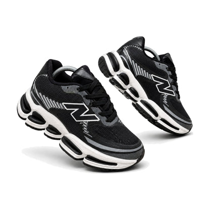New Balance 2000 color negro — par en vista 3D, fondo blanco