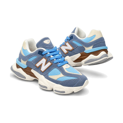 New Balance 9060 Dama color azul acero — par en vista 3D, fondo blanco