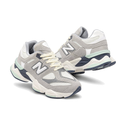New Balance 9060 Dama color gris — par en vista 3D, fondo blanco