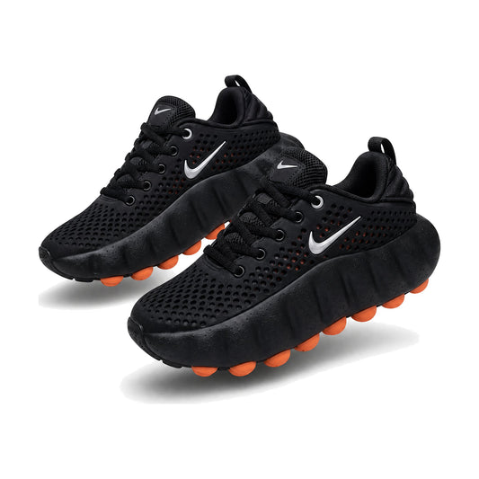 Nike Mind color negro — par en vista 3D, fondo blanco
