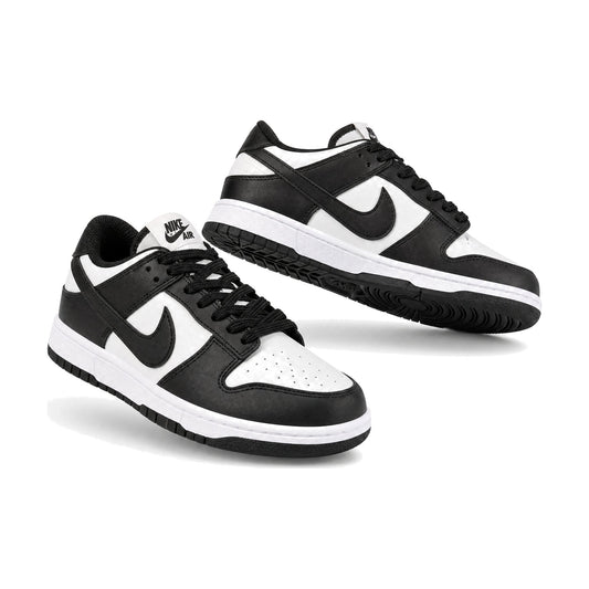 Nike SB Negro Blanco color negro blanco — par en vista 3D, fondo blanco